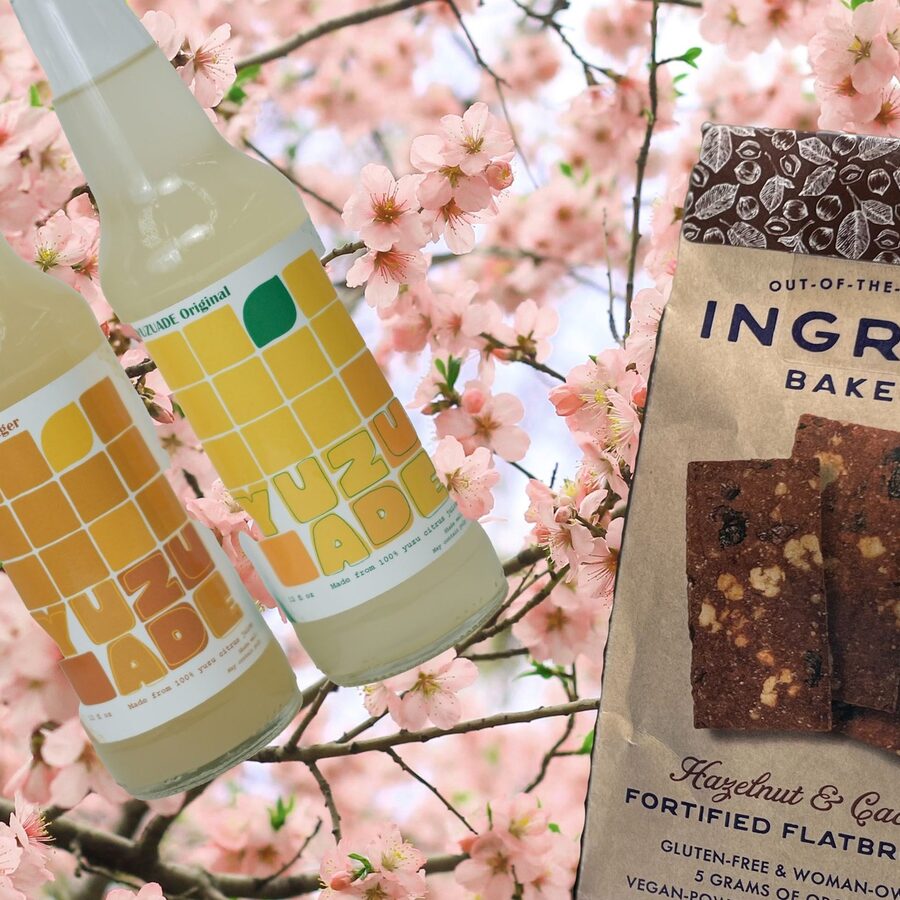 YUUZ bottle with Ingrid’s Bakery snacks under cherry blossoms